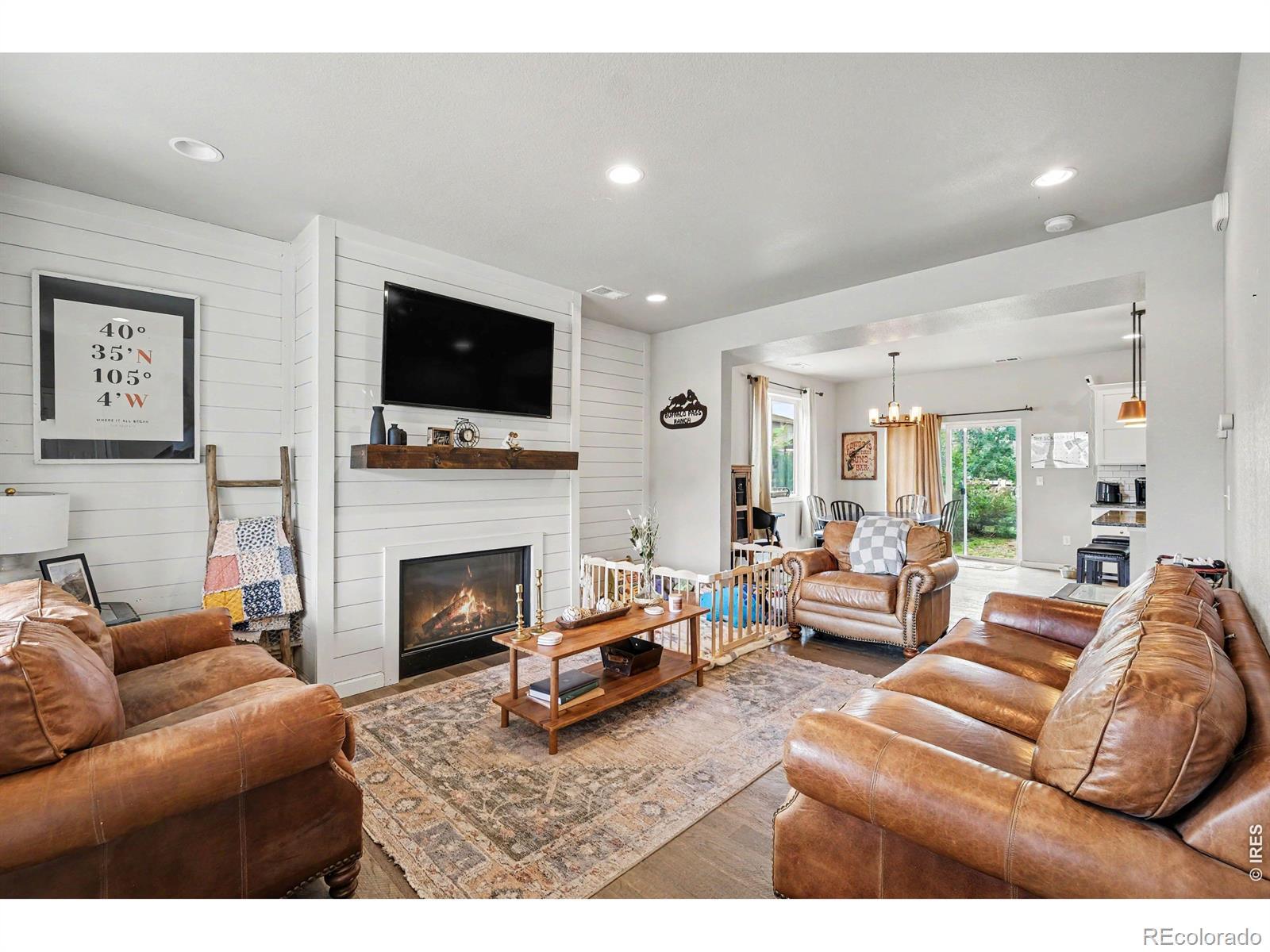 Image 3: Upon entry, you are welcomed into the comforting and warm living area - complete with fireplace and mantle to complete those picturesque COLORADO nights! Image 3: Upon entry, you are welcomed into the comforting and warm living area - complete with fireplace and mantle to complete those picturesque COLORADO nights!