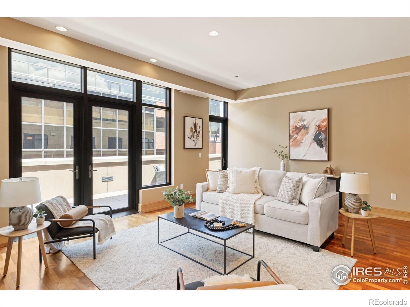Image 3: Living Room with Walk Out to the Patio