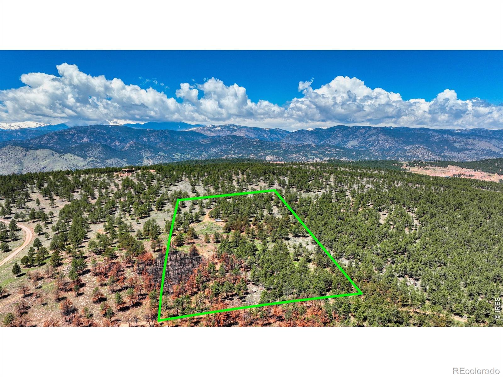 Image 2: Aerial facing west, with approximated property outlines. Very little burn scar on actual property. Image 2: Aerial facing west, with approximated property outlines. Very little burn scar on actual property.