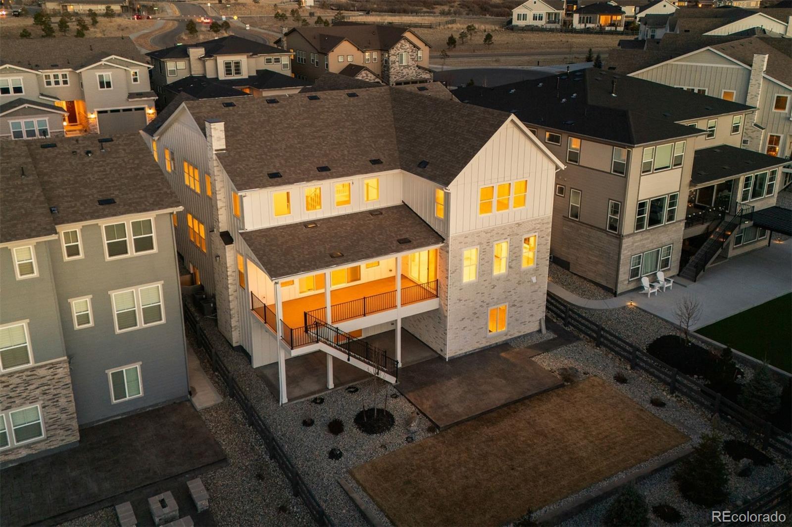 Image 2: A flat, fenced back yard with stamped concrete patio and additional upper covered deck creates an ideal setting for relaxation or gatherings. Image 2: A flat, fenced back yard with stamped concrete patio and additional upper covered deck creates an ideal setting for relaxation or gatherings.