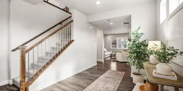 Image 3: Premium trim package with open railing and beautifully stained handrails adds warmth and an elevated architectural touch. Image 3: Premium trim package with open railing and beautifully stained handrails adds warmth and an elevated architectural touch.