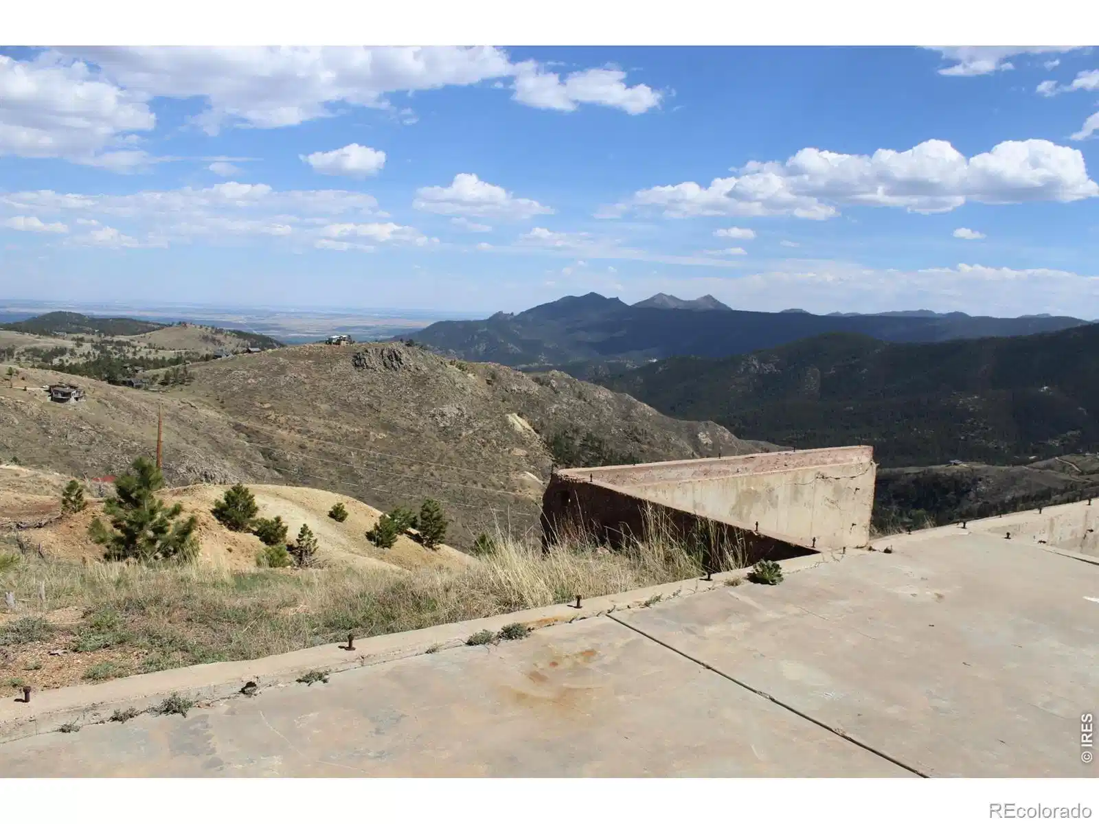 Image 1: Foundation view looking East toward Boulder and the backside of the Flatirons ( Green mtn & Bear Peak