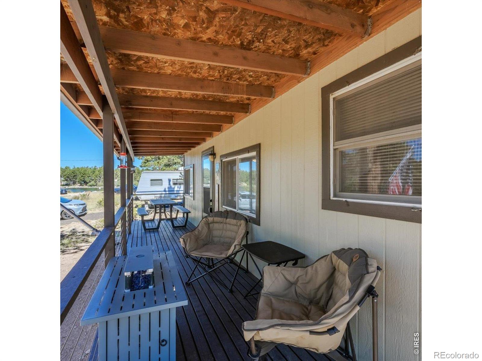 Image 3: Relax on the Covered Front Porch and watch the time go by. Image 3: Relax on the Covered Front Porch and watch the time go by.