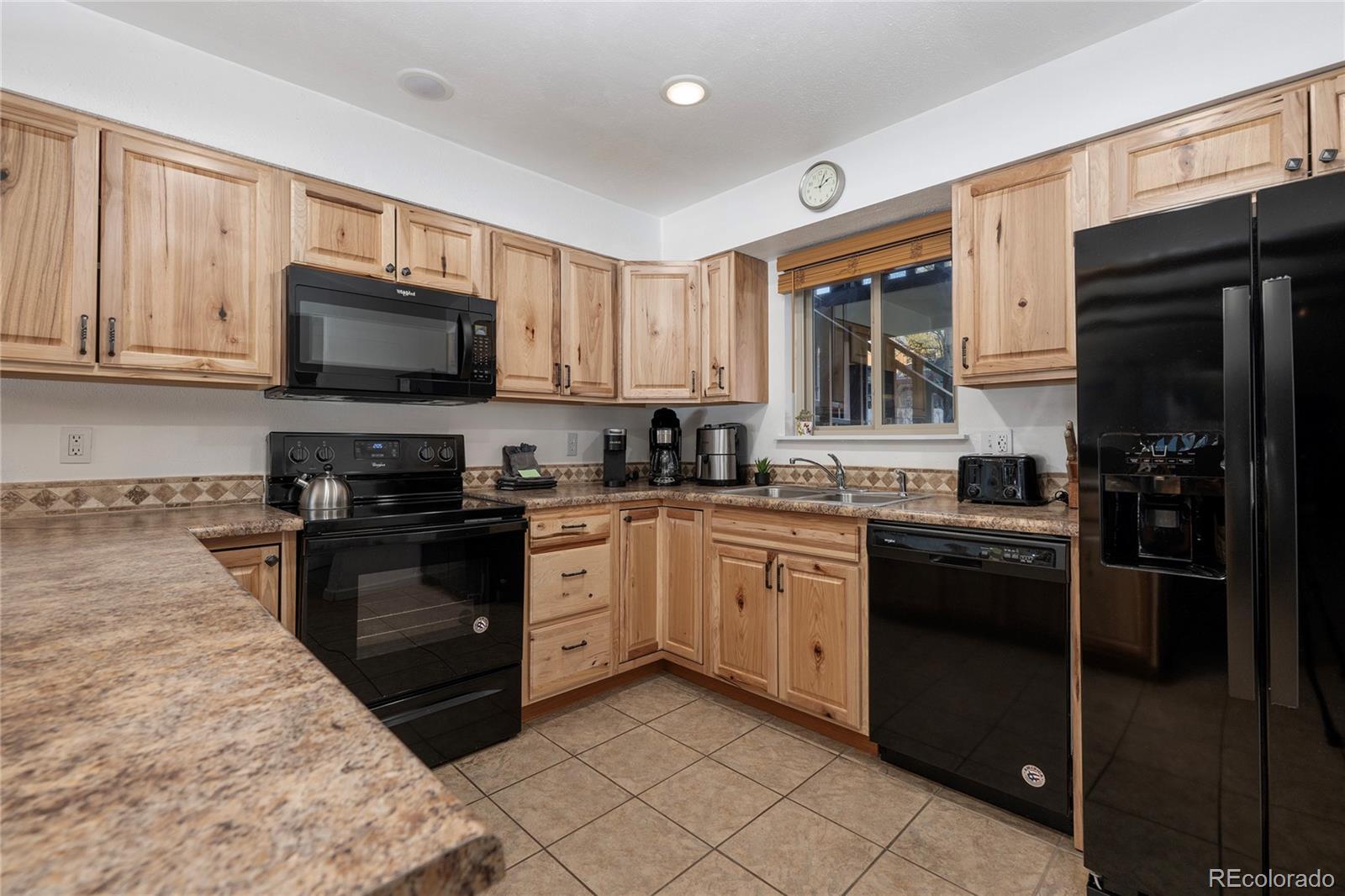 Image 3: Kitchen with lots of cabinets and counter space