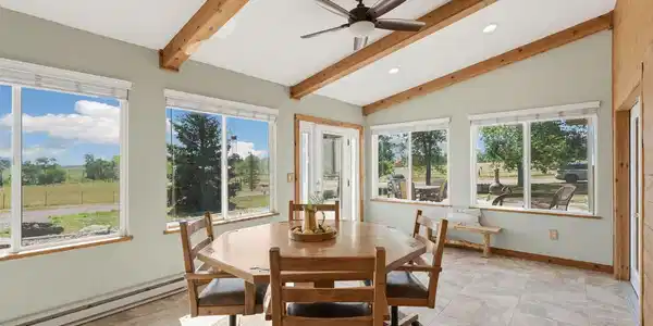 Image 3: Sun Room off Main Entry...tons of natural light! Image 3: Sun Room off Main Entry...tons of natural light!