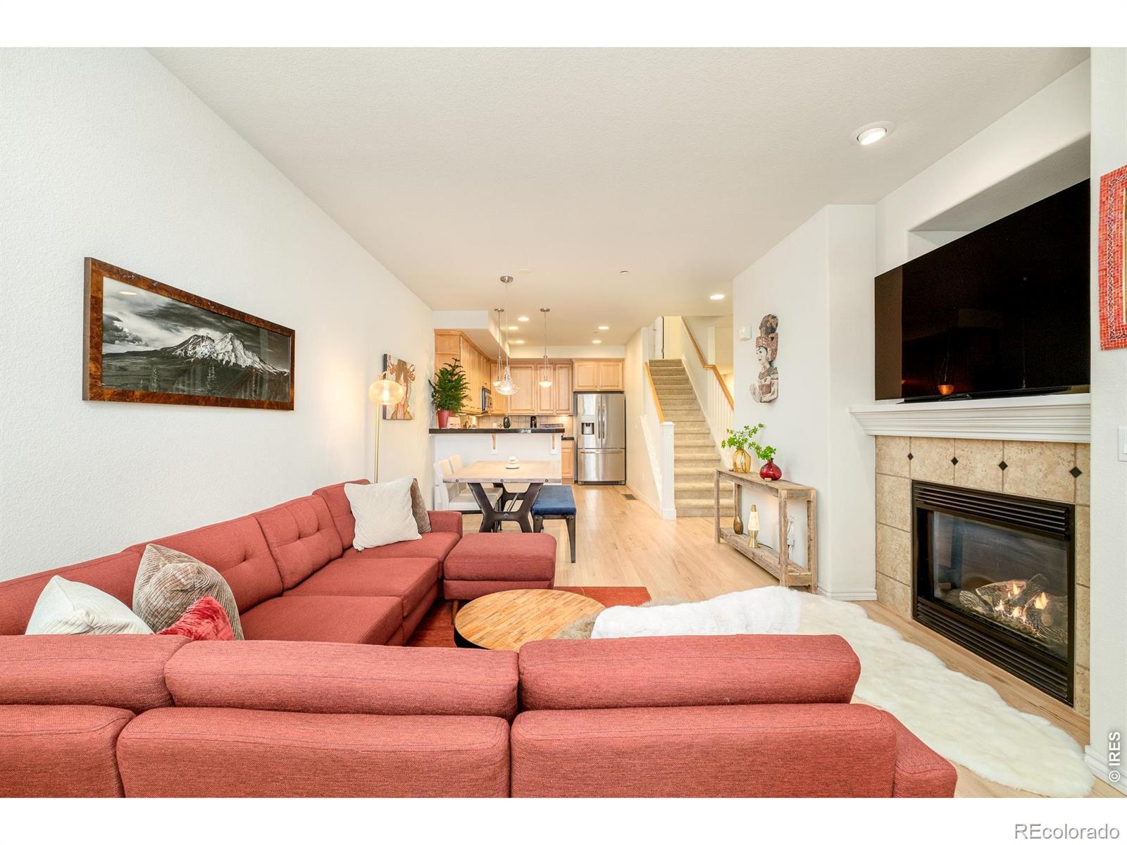 Image 3: the open main level connects the living, dining and kitchen spaces... Image 3: the open main level connects the living, dining and kitchen spaces...
