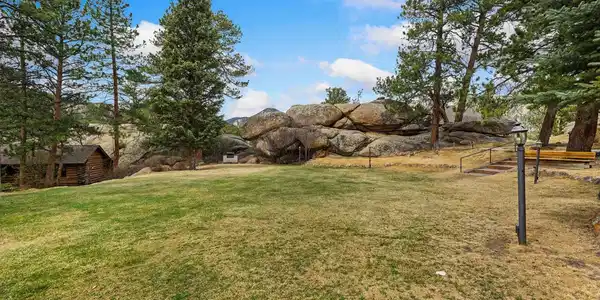 Image 3: Beautiful meadow and rock outcroppings next to condo Image 3: Beautiful meadow and rock outcroppings next to condo