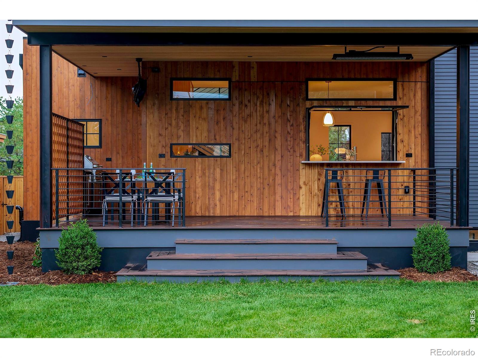 Image 4: Bamboo Back Deck with Cool Flip Up Window Bar & Outdoor BBQ Kitchen!