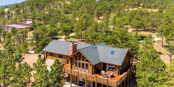 Image 2: Gorgeous log home on 2.6 forested acres only 6 minutes to Lyons