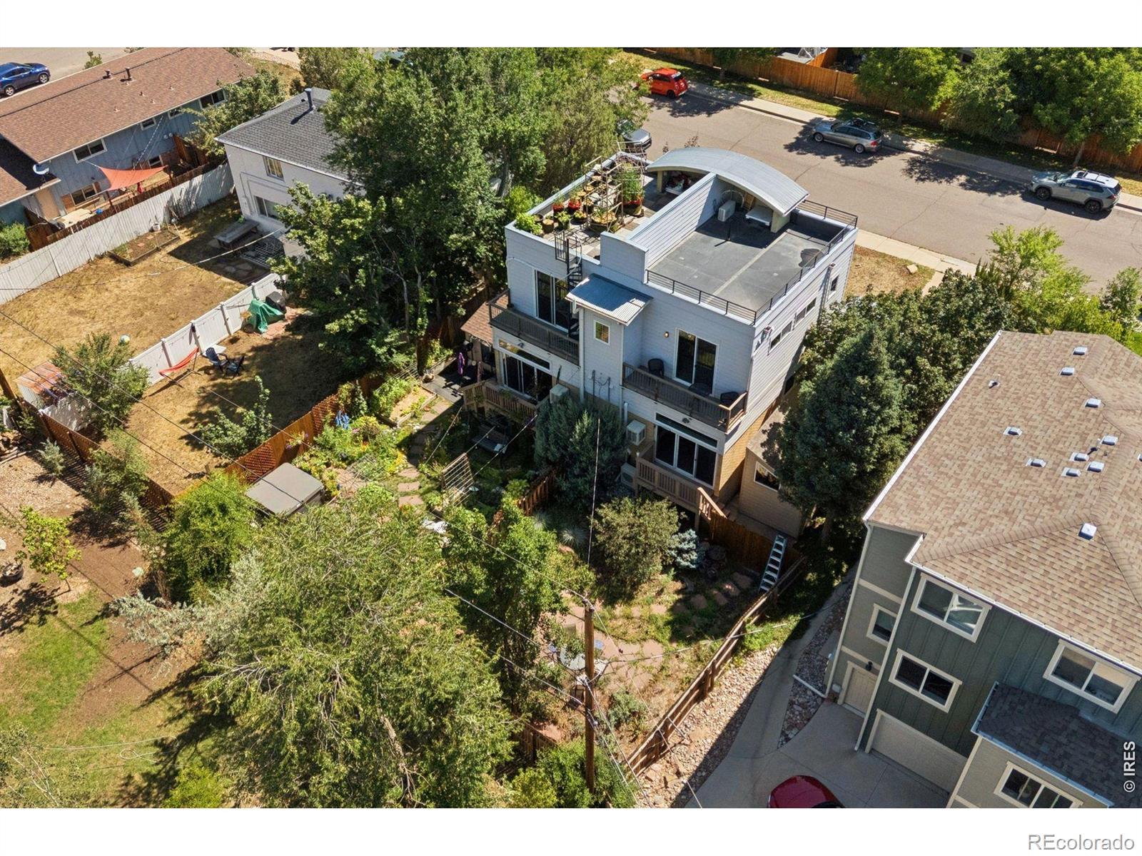 Image 2: The neighbor has a roof-top deck. Image 2: The neighbor has a roof-top deck.