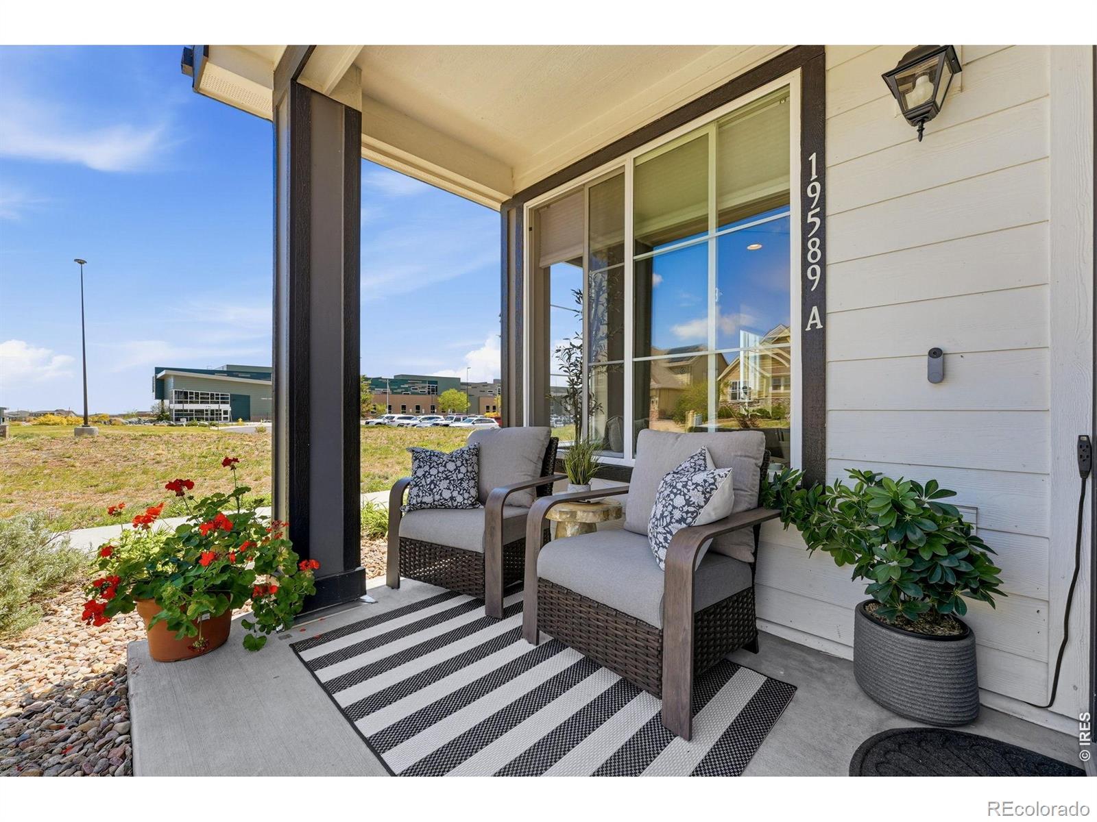 Image 2: Private Front Porch with Outlet and Video Doorbell.