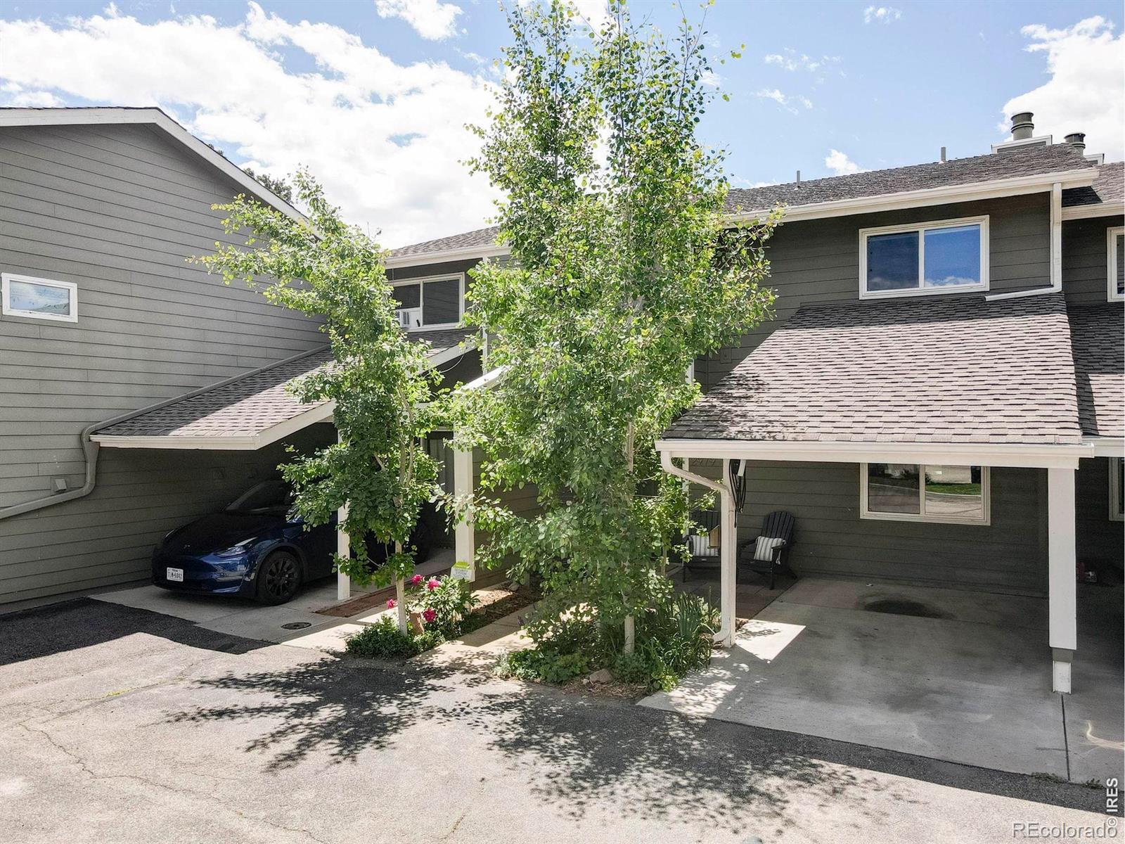Image 4: This thoughtfully updated townhome includes a convenient attached covered carport with clever built-in additional storage, and a separate reserved off street parking spot directly in front of the unit Image 4: This thoughtfully updated townhome includes a convenient attached covered carport with clever built-in additional storage, and a separate reserved off street parking spot directly in front of the unit