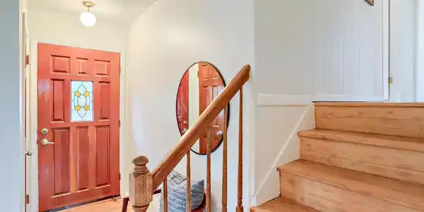 Image 3: Front Entry. A coat closet is conveniently located at the entrance and the stairs take you to the upper level bedrooms and full bath. Image 3: Front Entry. A coat closet is conveniently located at the entrance and the stairs take you to the upper level bedrooms and full bath.