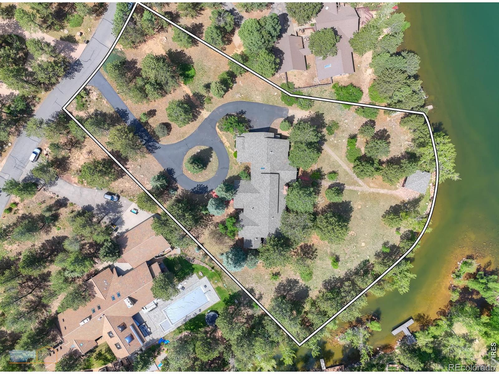 Image 4: One of the Best lots on the lake! Remodel the solid 70s house or build new! Image 4: One of the Best lots on the lake! Remodel the solid 70s house or build new!