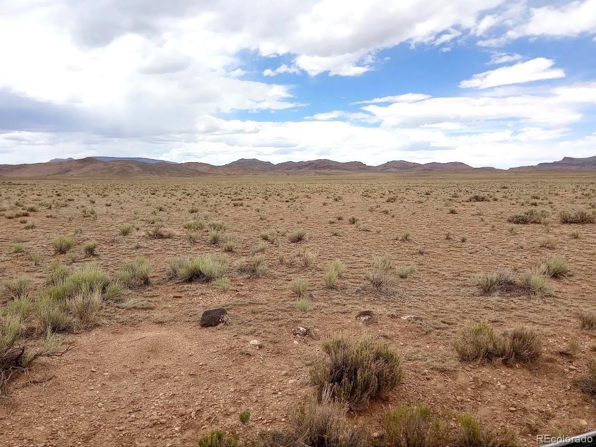 Image 2: Large volcanic rock is the approx coener of property