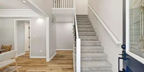 Image 4: Gorgeous entryway with private office to the right and dedicated dining to the left