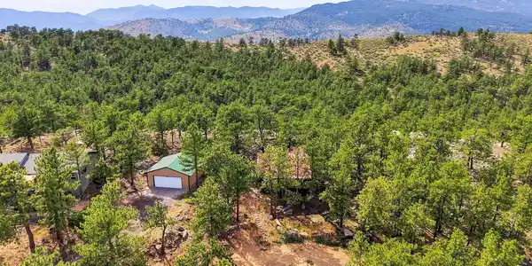 Image 3: Behind the home, enjoy stunning mountain views