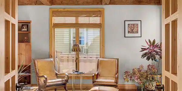 Image 3: Main level living room; could also by a 5th bedroom.