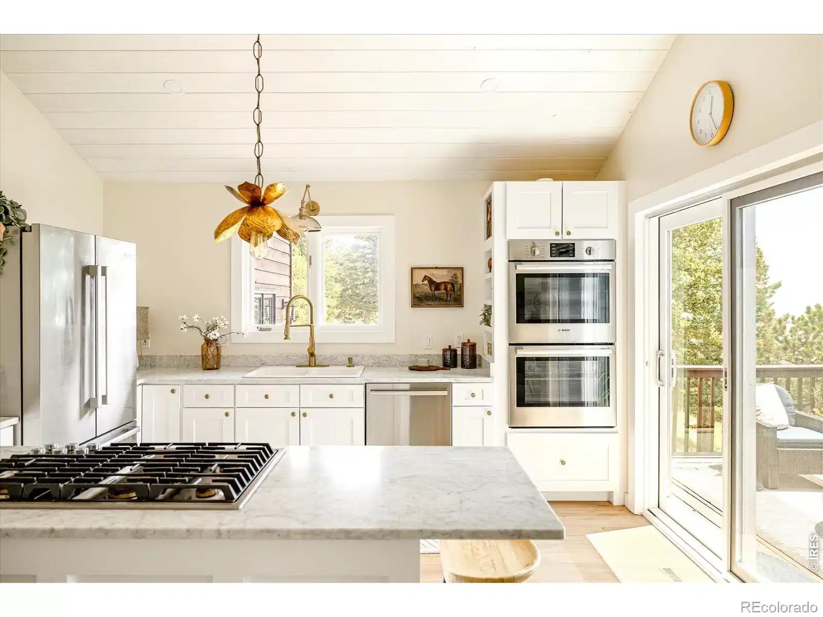 Image 1: Newly Remodeled Kitchen with Marble Countertops and Solid Wood Custom Cabinetry
