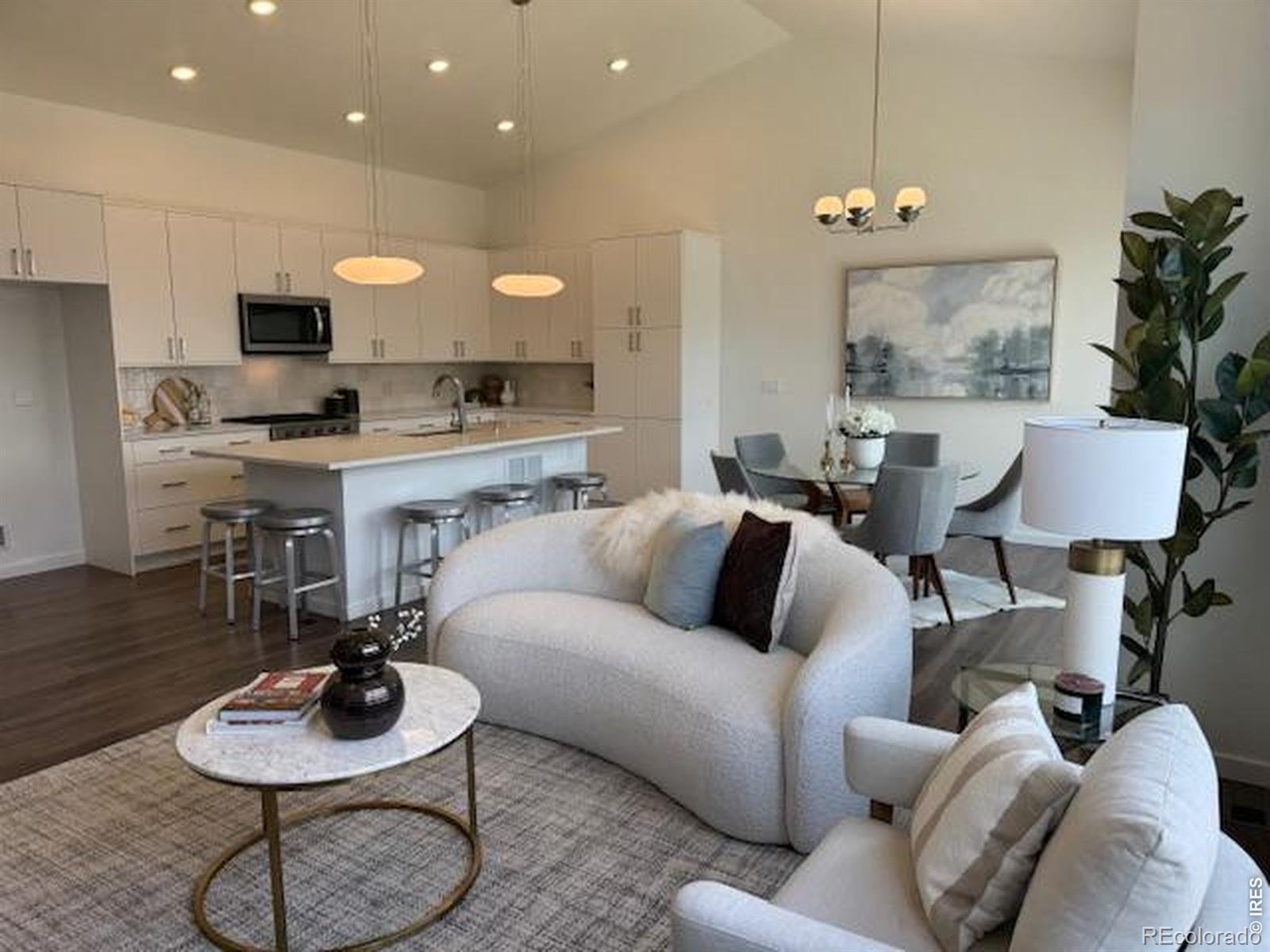 Image 1: Open floorplan with vaulted ceiling -Photos of a similar home