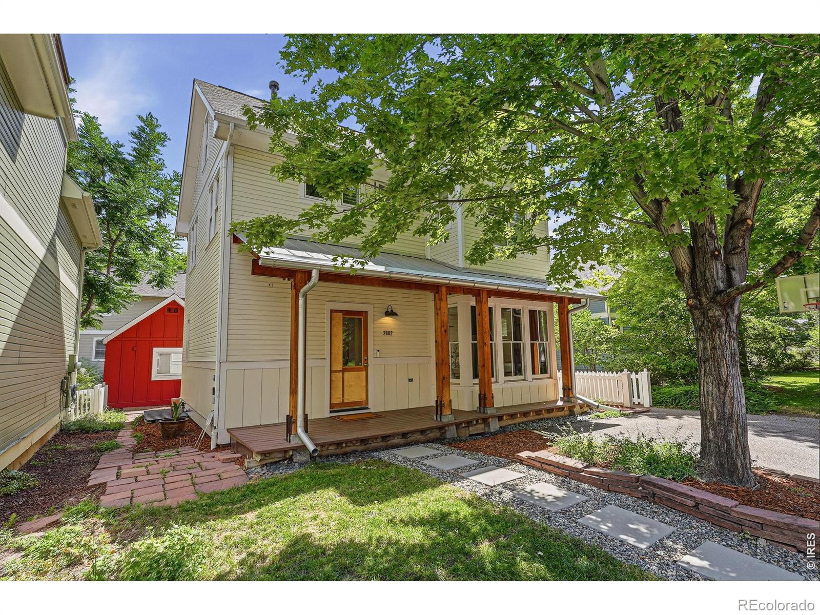Image 3: Shaded by a big, deciduous tree and served by a quant walkway; you can sit on this front porch for hours at a time. Image 3: Shaded by a big, deciduous tree and served by a quant walkway; you can sit on this front porch for hours at a time.