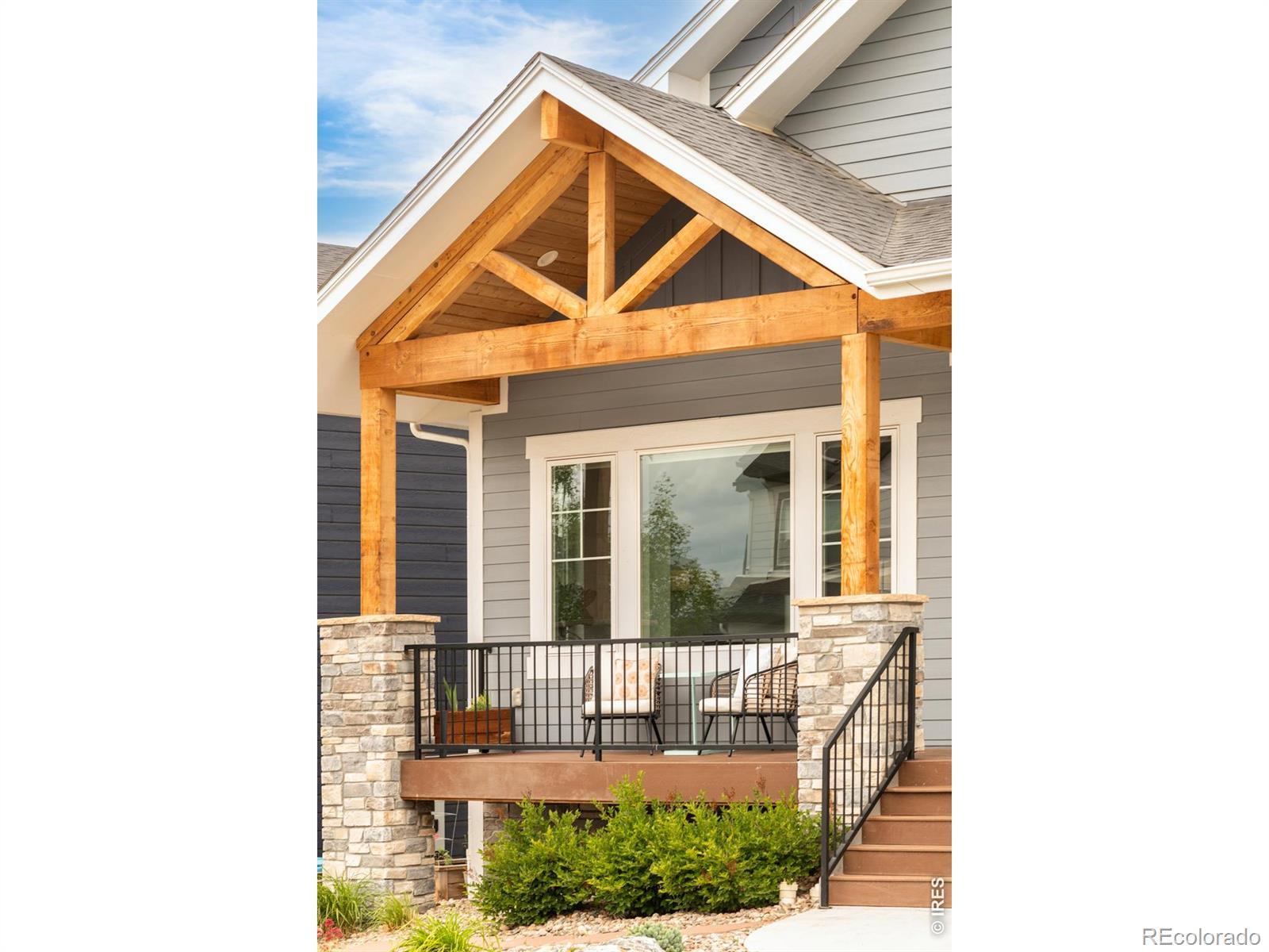 Image 2: Reclaimed Colorado pine welcomes you home, adding warmth, texture, and authentic Colorado charm to the inviting front porch. Image 2: Reclaimed Colorado pine welcomes you home, adding warmth, texture, and authentic Colorado charm to the inviting front porch.