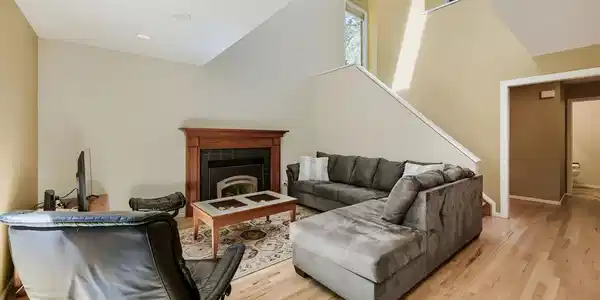 Image 3: Vaulted ceilings stream natural light through the main floor. Image 3: Vaulted ceilings stream natural light through the main floor.