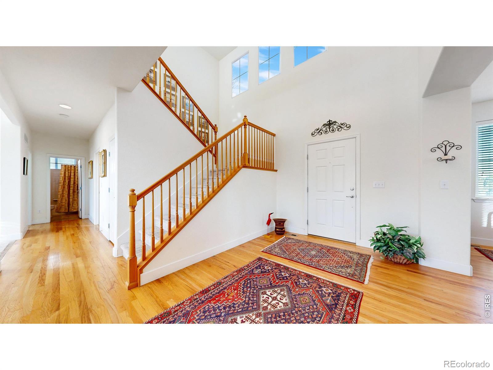 Image 3: Front Foyer and Stairway to the Upper Level Image 3: Front Foyer and Stairway to the Upper Level