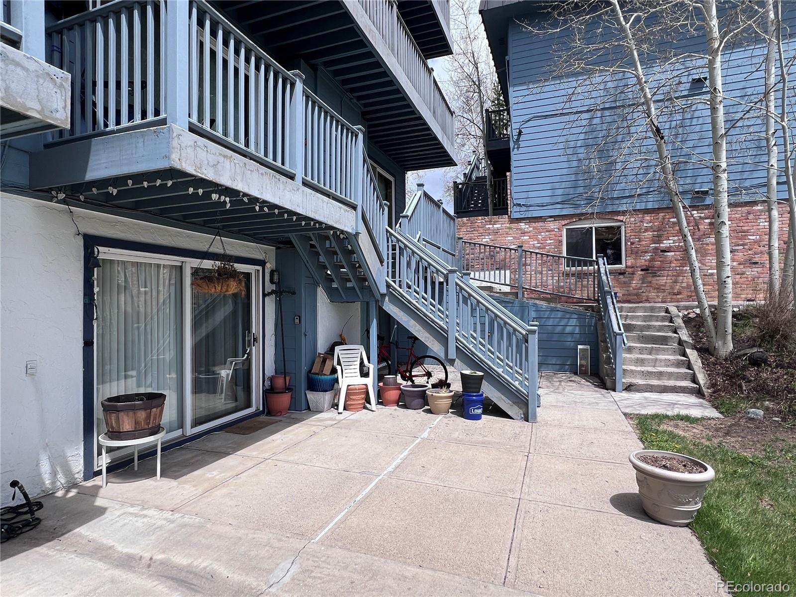 Image 2: Large patio area stretching out to the community lawn
