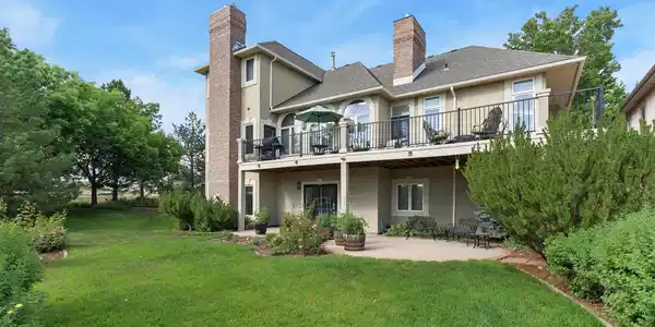 Image 4: Back of the home faces the Mountains and the Lake, enjoy incredible Sunsets from the deck! Image 4: Back of the home faces the Mountains and the Lake, enjoy incredible Sunsets from the deck!