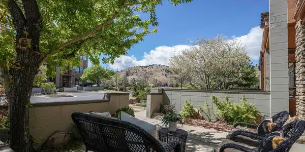 Image 4: South facing patio looking at the Foothills