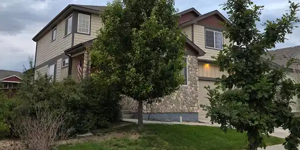 Image 2: Left View of Front of Home
