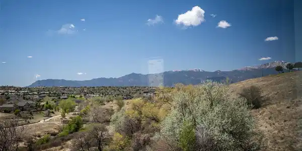 Image 3: Expansive mountain range backdrop and distant snow-capped peaks Image 3: Expansive mountain range backdrop and distant snow-capped peaks