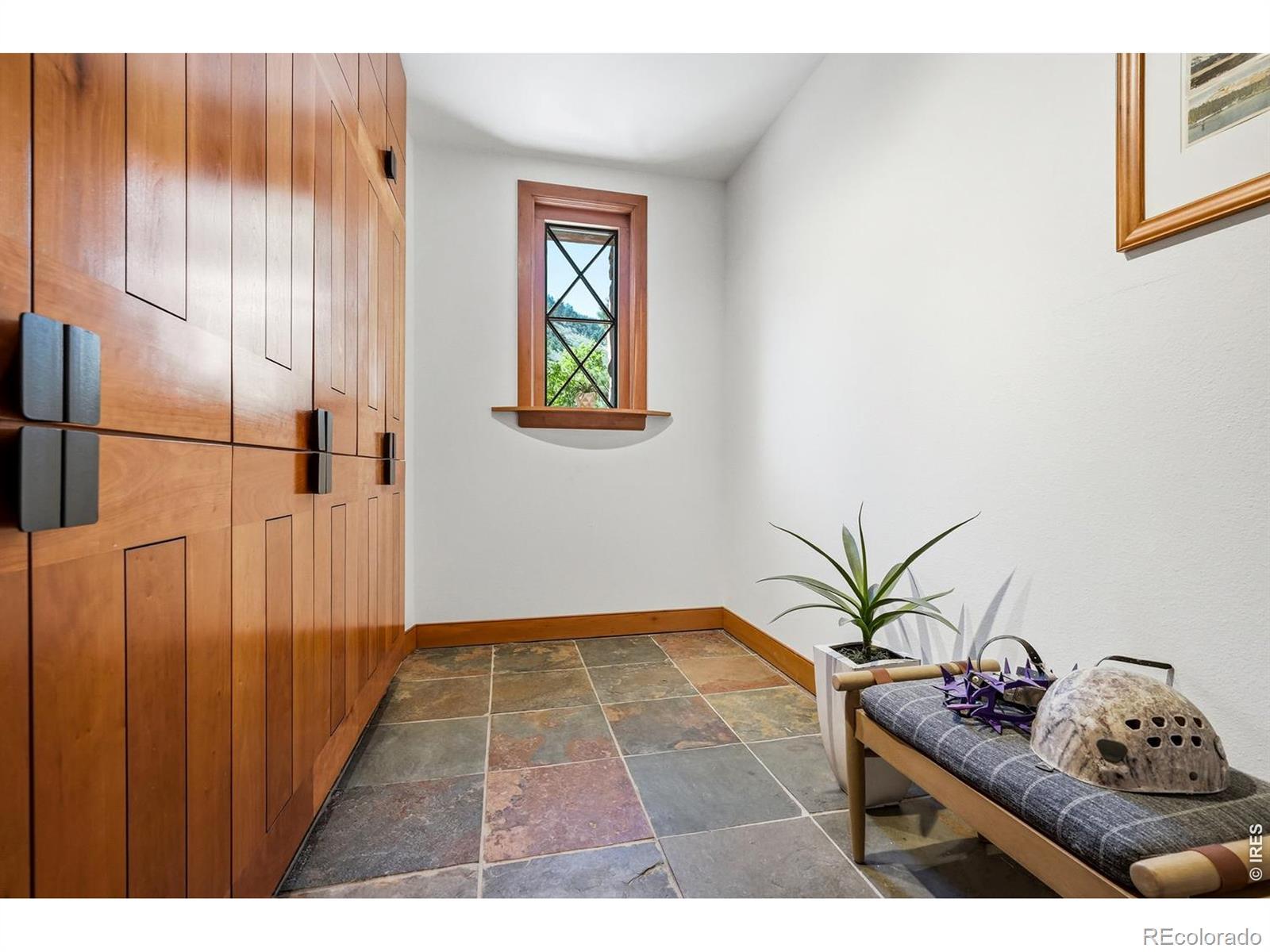 Image 4: Storage abounds in this home. Gear-heads rejoice. Image 4: Storage abounds in this home. Gear-heads rejoice.
