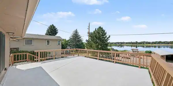 Image 4: Expansive deck with gorgeous view of the lake Image 4: Expansive deck with gorgeous view of the lake