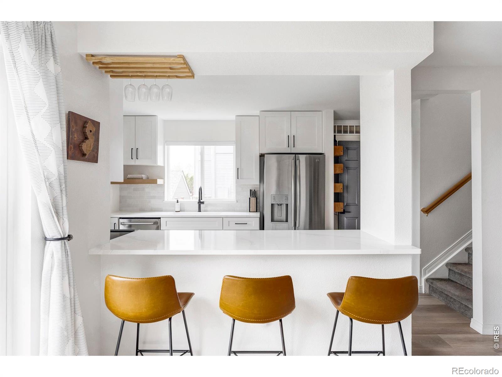 Image 2: Kitchen bar seating.