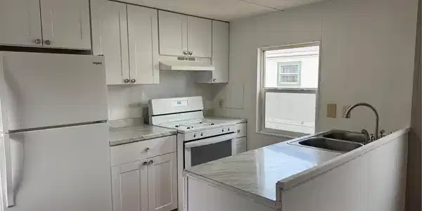 Image 4: Spacious kitchen with natural light