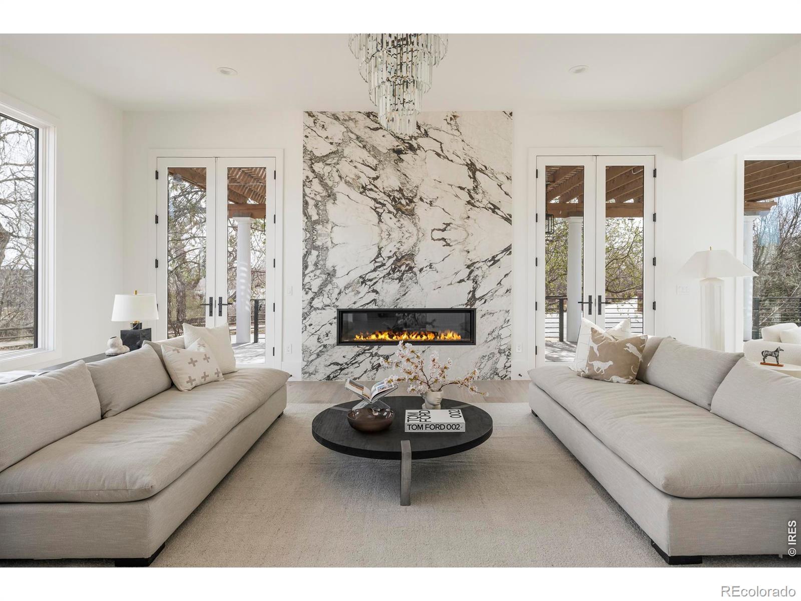 Image 4: Front living room with gas fireplace and views overlooking the Polo Fields