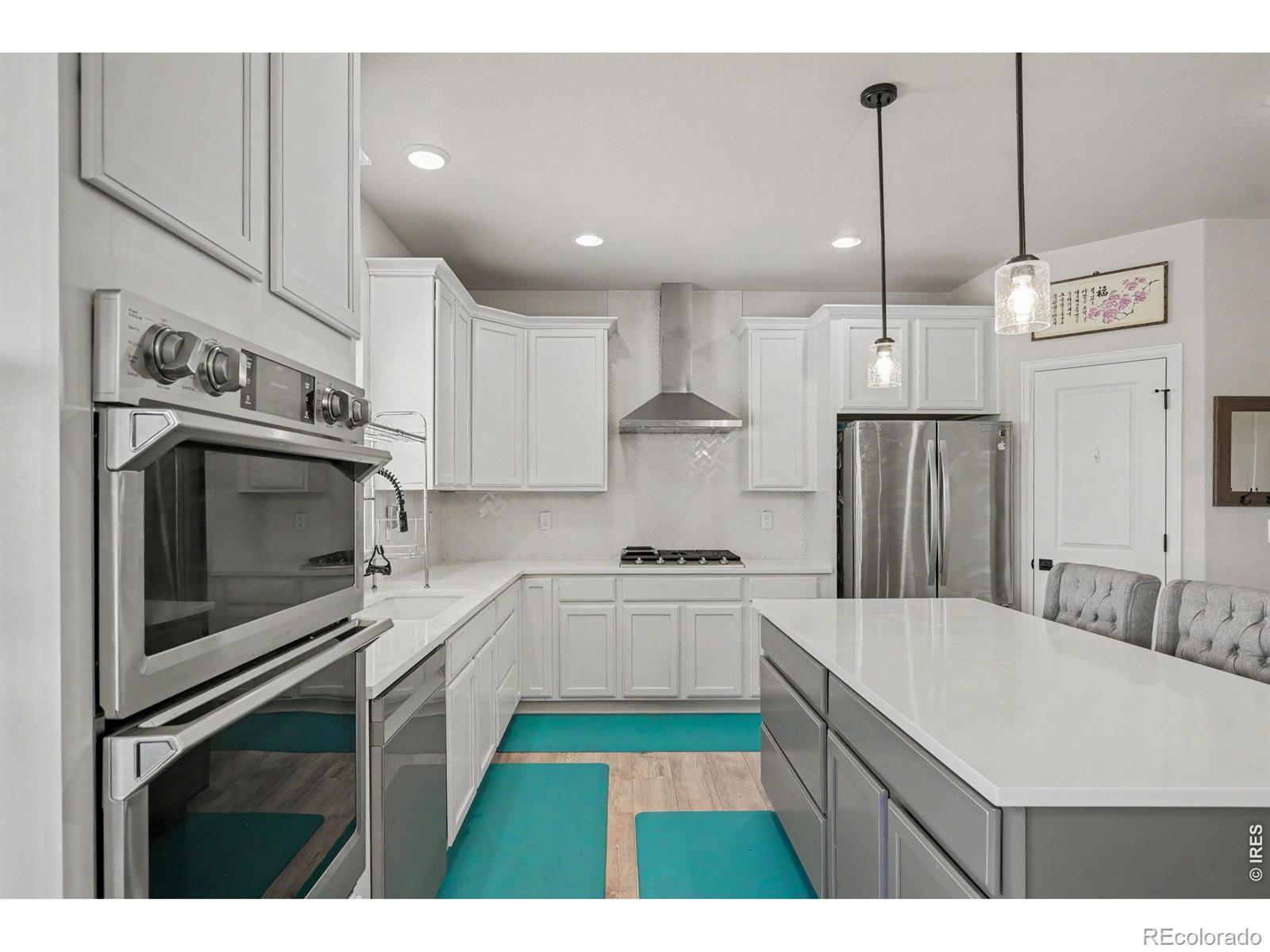 Image 3: Plenty of work space on the quartz countertops and island Image 3: Plenty of work space on the quartz countertops and island