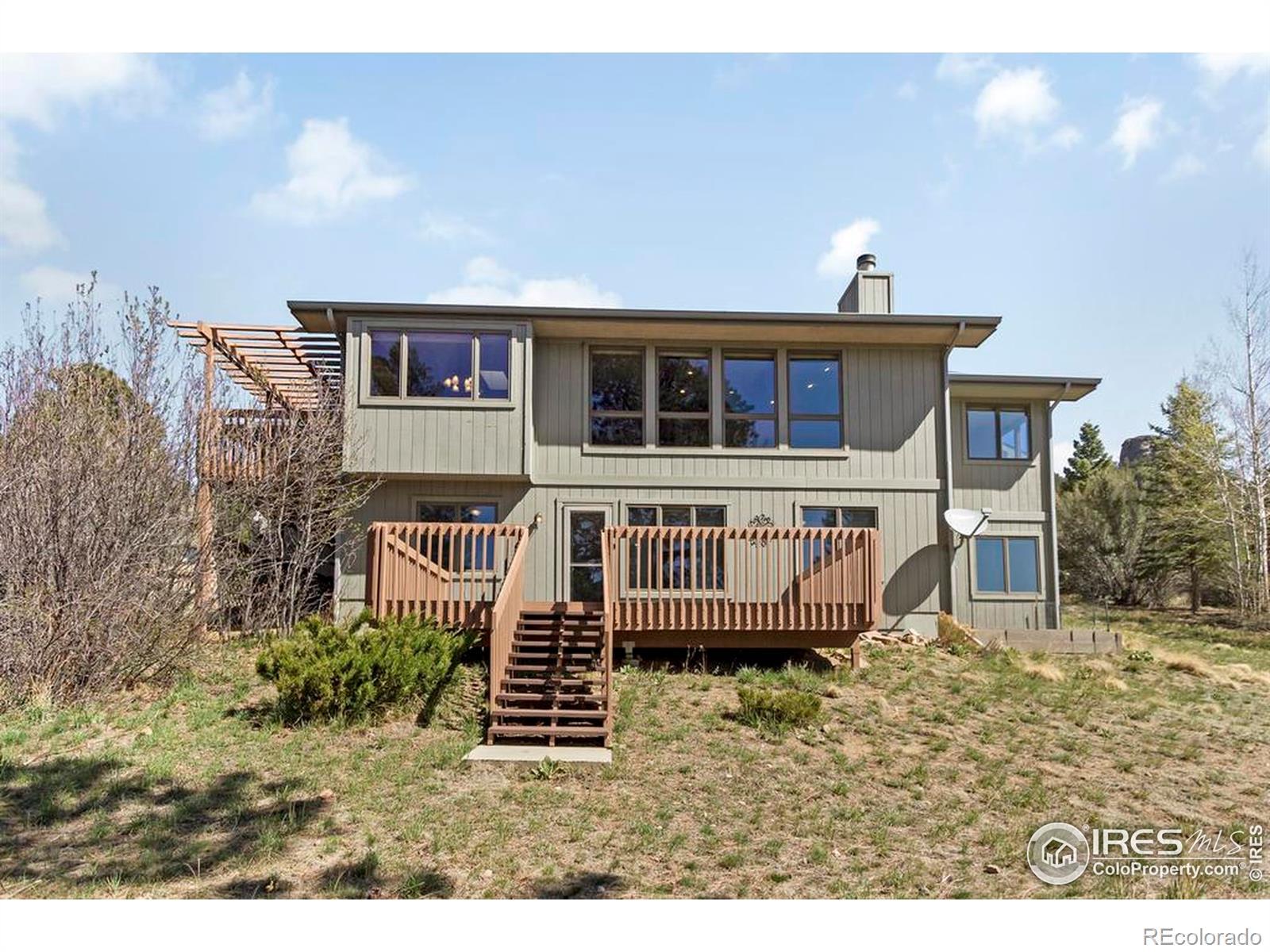 Image 2: View from the back yard. Room for the kids to play. Enjoy mountain living at its best!