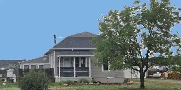 Image 2: East Side of the home - Covered front patio