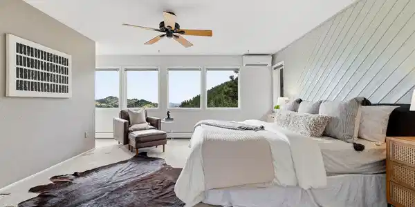 Image 3: Primary bedroom with incredible views over the valley Image 3: Primary bedroom with incredible views over the valley