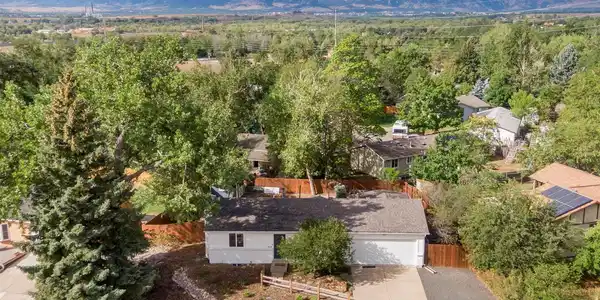 Image 2: Aerial of Front of Home