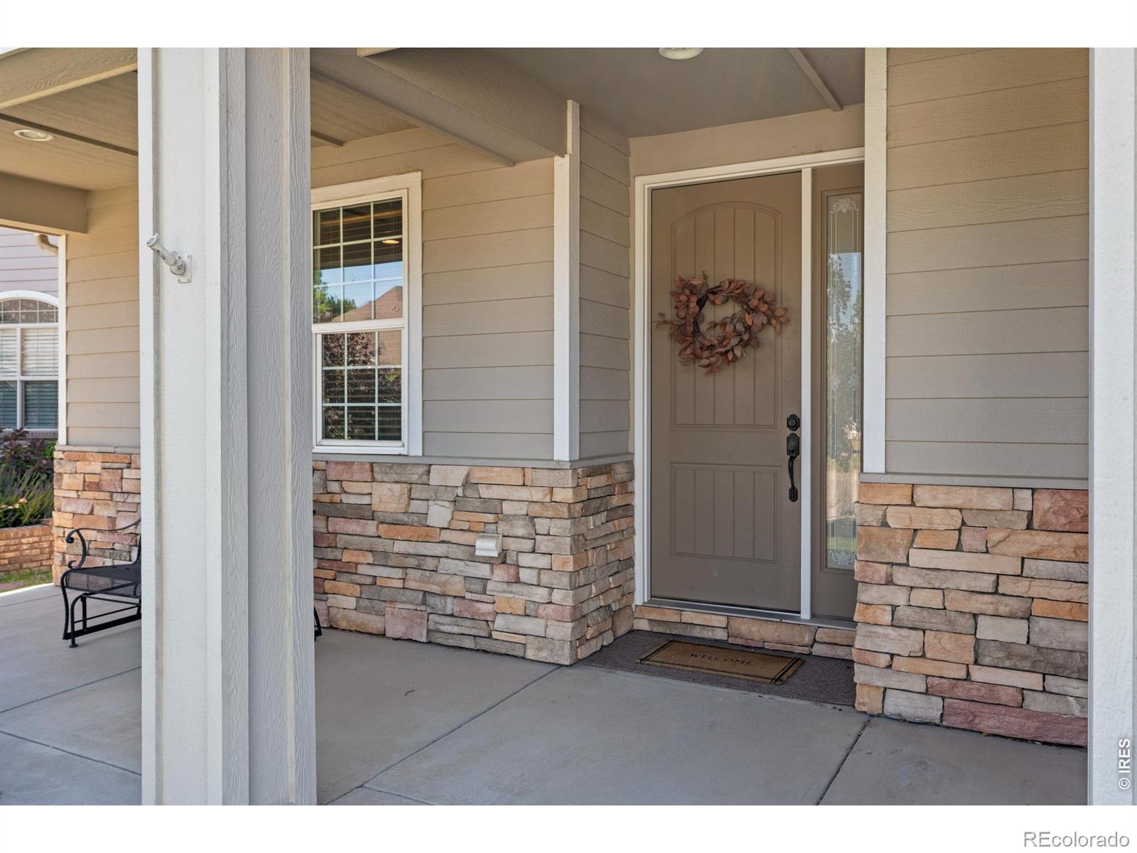 Image 3: Large front porch and welcoming entry!