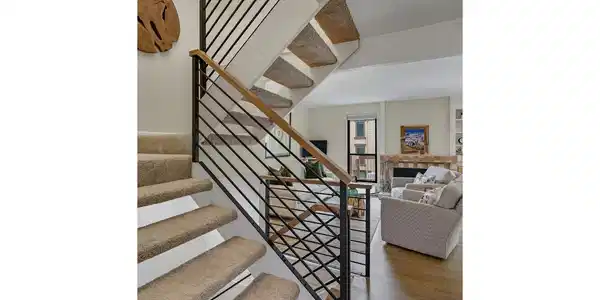 Image 3: Welcoming entry with custom railings to match the solid white oak hardwood floors. Image 3: Welcoming entry with custom railings to match the solid white oak hardwood floors.