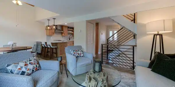Image 4: Comfortable main level with remodeled kitchen, new White Oak hardwood floors, new lighting, and lots of light! Image 4: Comfortable main level with remodeled kitchen, new White Oak hardwood floors, new lighting, and lots of light!
