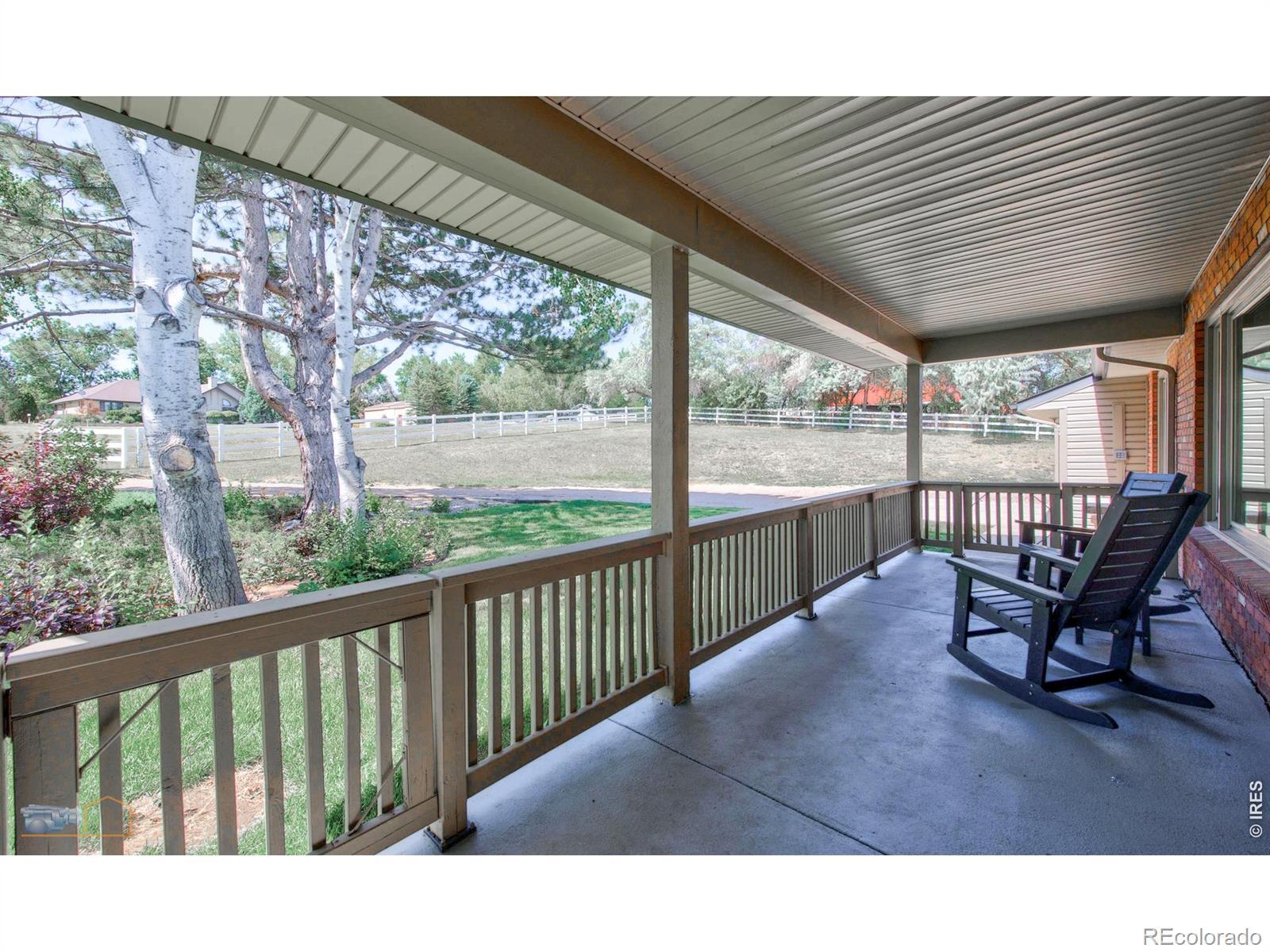 Image 2: Private, covered front porch.