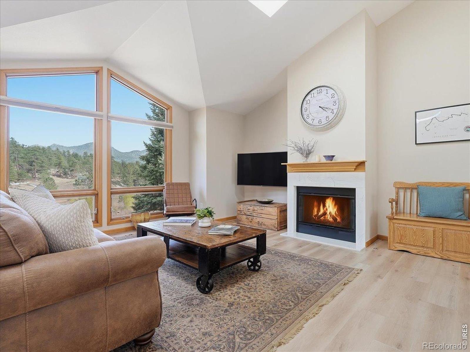 Image 3: Comfortable living space centered around a cozy gas fireplace Image 3: Comfortable living space centered around a cozy gas fireplace