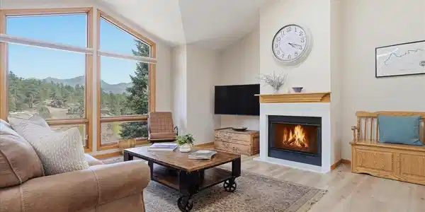 Image 3: Comfortable living space centered around a cozy gas fireplace Image 3: Comfortable living space centered around a cozy gas fireplace
