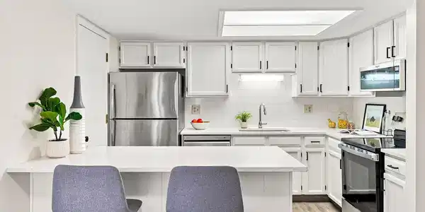 Image 2: Remodeled kitchen with plenty of storage and counter space Image 2: Remodeled kitchen with plenty of storage and counter space